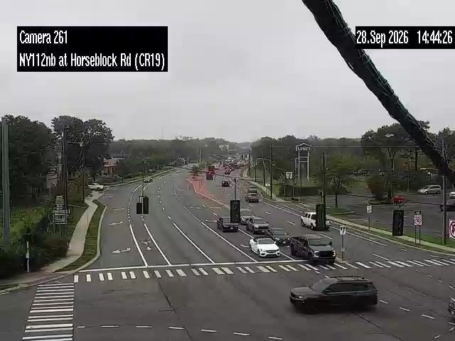 Дорога NY 112 Северное направление на Horseblock Road (CR 16)